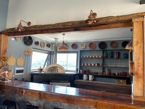 Fridge, stovetop, coffee/tea maker, electric kettle