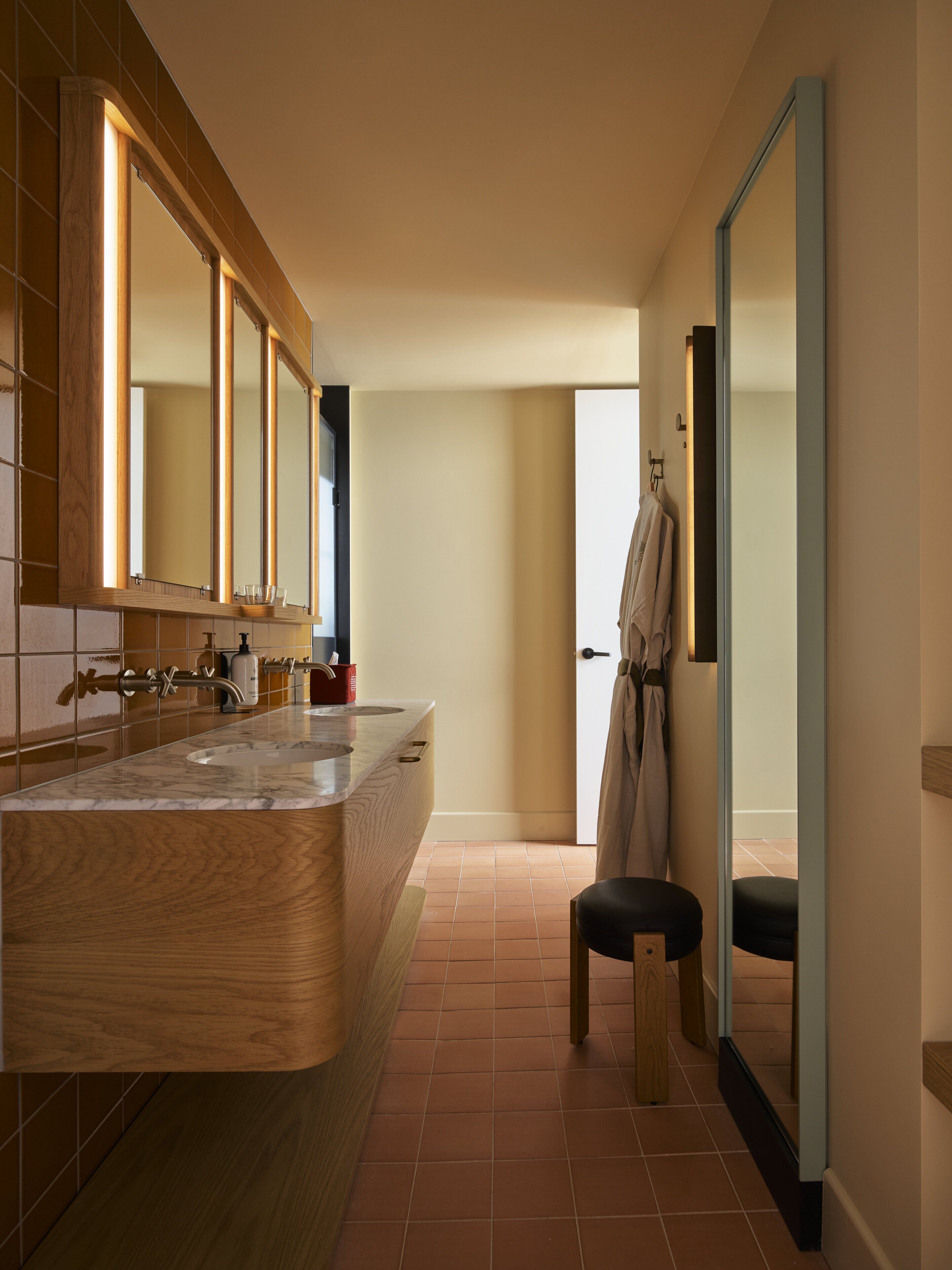 suite | bathroom | designer toiletries, hair dryer, bathrobes, towels