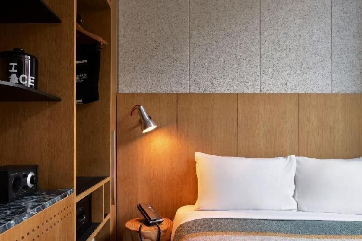 Premium bedding, down comforters, memory foam beds, minibar