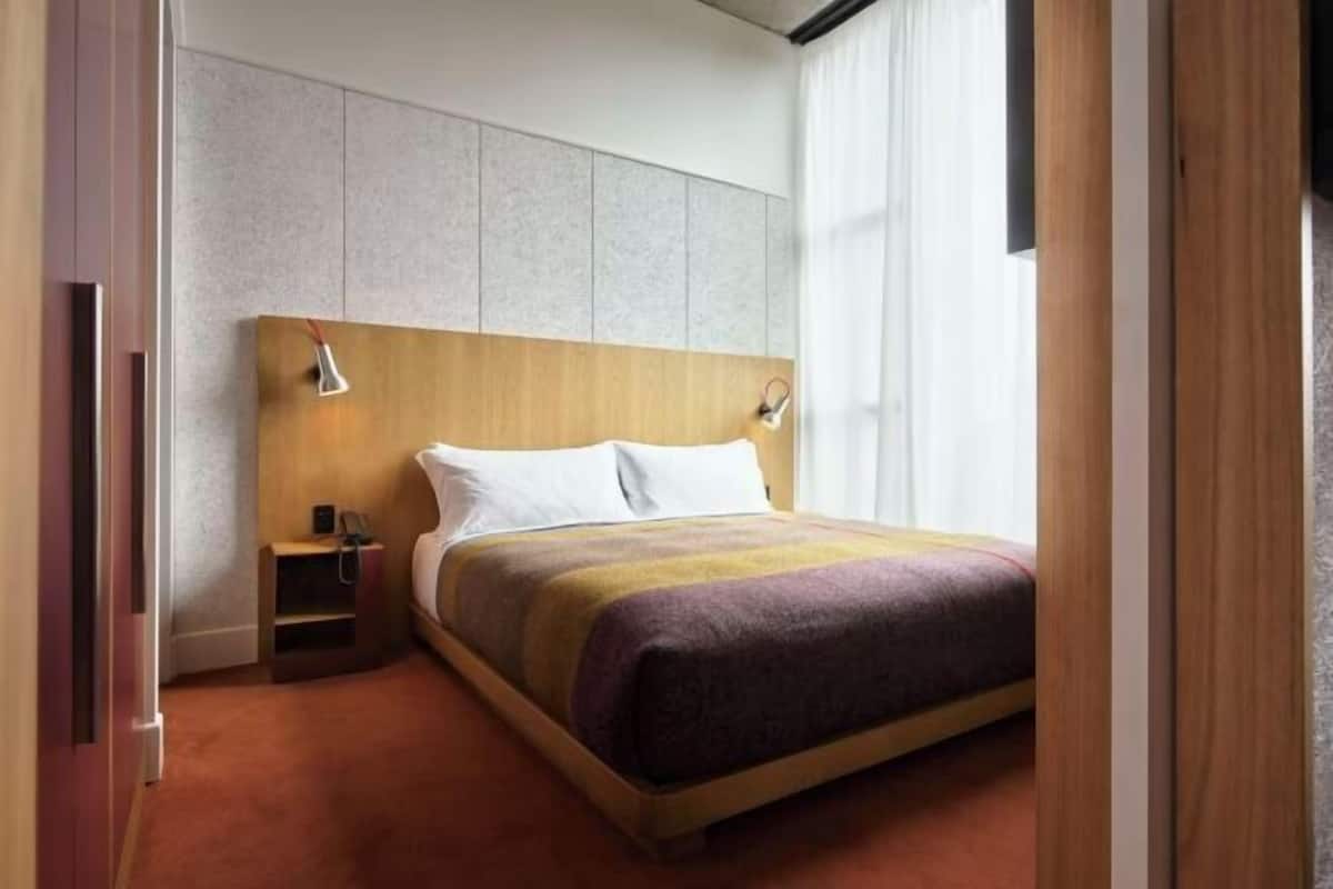 Premium bedding, down duvets, memory-foam beds, minibar