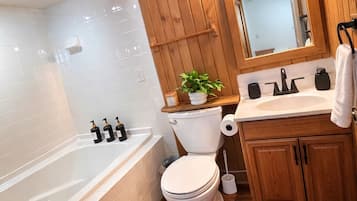 Ensemble douche/baignoire, baignoire Ă jets, savon, shampoing