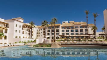 2 outdoor pools, pool umbrellas, pool loungers