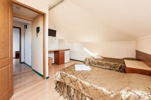 Suite familiare | 1 camera, una cassaforte in camera, Wi-Fi gratuito