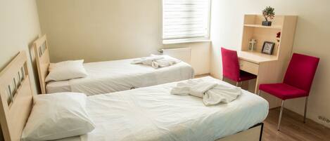 Economy-huoneisto, useita sänkyjä | 1 makuuhuone, ilmainen Wi-Fi, vuodevaatteet