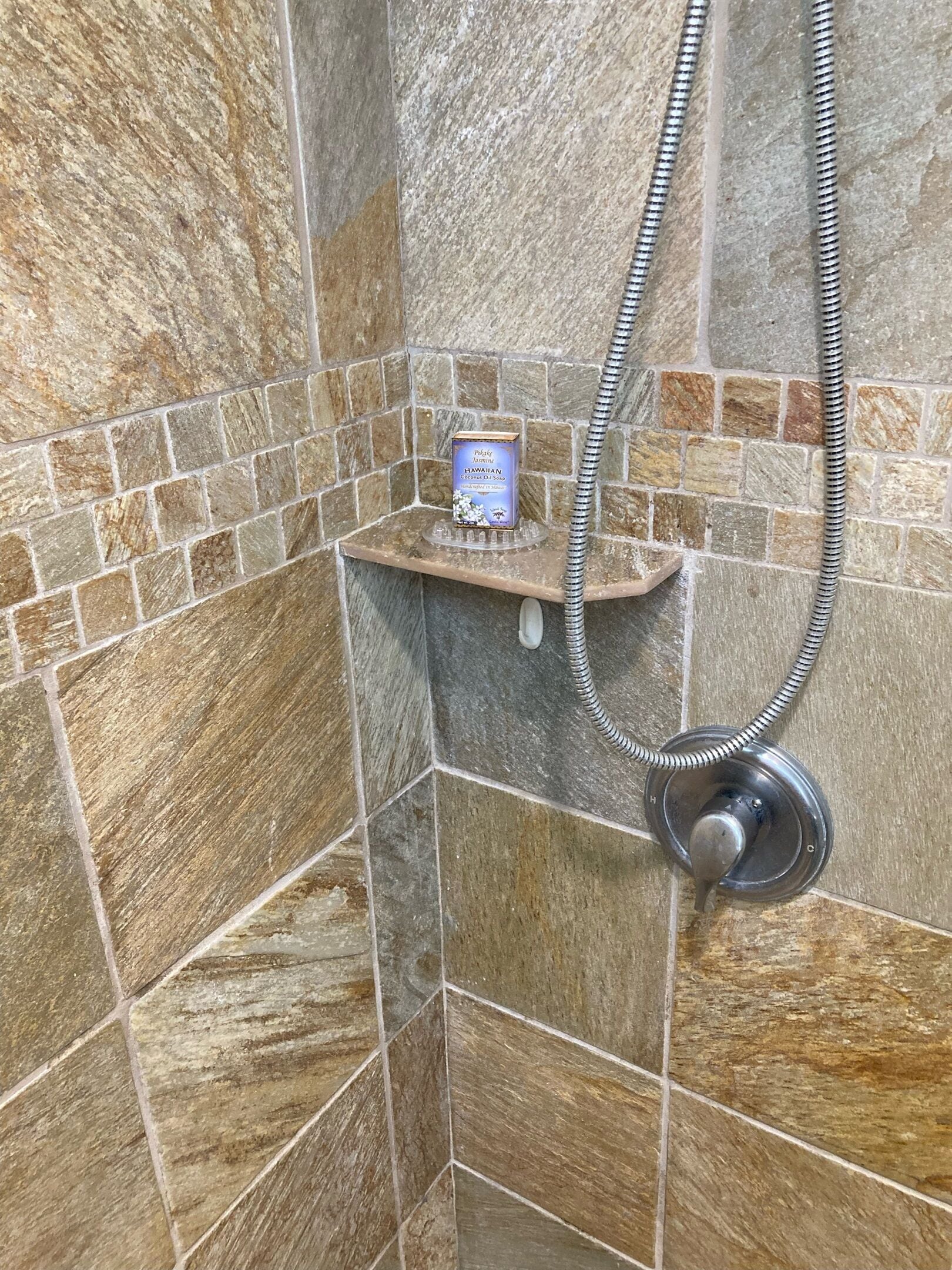 Combined shower/tub, hair dryer, towels, soap