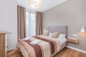 1 slaapkamer, een bureau, een strijkplank/strijkijzer, wifi