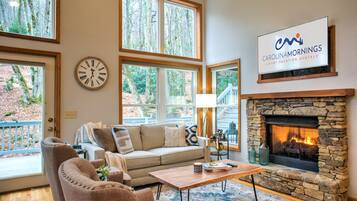 Smart TV, fireplace, books, offices