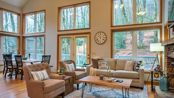 Smart TV, fireplace, books, offices