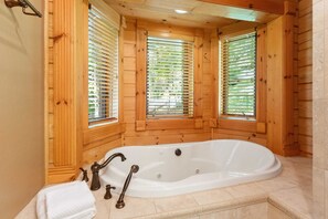 Shower, jetted tub, towels