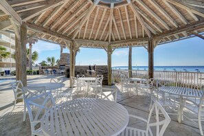 Outdoor dining - Gulf Front Condo | Outdoor & Indoor Pools! (Orange Beach)