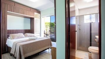 Suite Deluxe Com Varanda | Frigobar, Wi-Fi de cortesia, roupa de cama