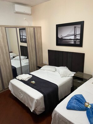 Quarto Quadruplo Standard | Frigobar, Wi-Fi de cortesia, roupa de cama