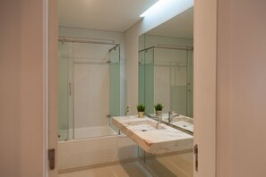 Bathtub, hair dryer, towels