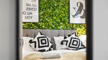 2 bedrooms, desk, iron/ironing board, travel crib