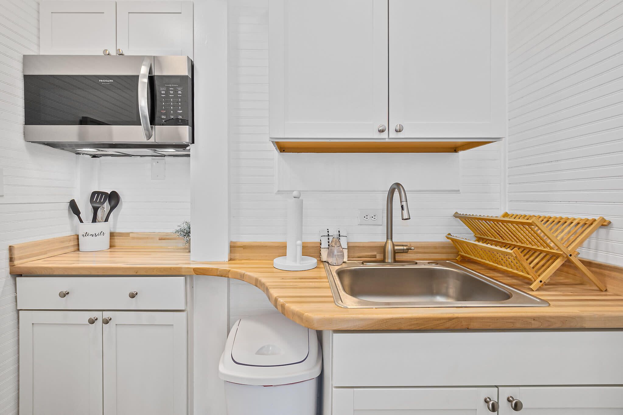 Fridge, microwave, coffee/tea maker, toaster