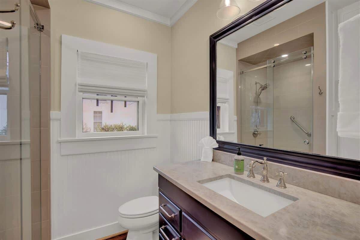 Shower, hair dryer, towels, shampoo