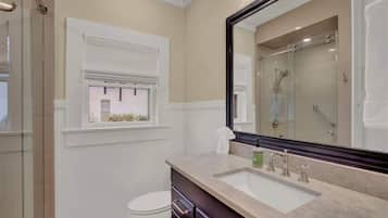 Shower, hair dryer, towels, shampoo