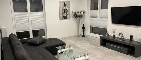 Ático presidencial | Zona de estar | Una Smart TV, una consola de videojuegos, Netflix, películas de pago