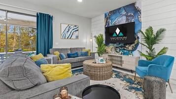 Smart TV, console de videogame, pebolim, livros