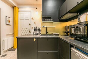 Fridge, microwave, dishwasher, coffee/tea maker