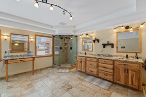 Combined shower/tub, hair dryer, towels, soap