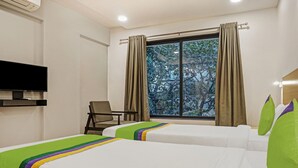 Habitación doble Deluxe | Tabla de planchar con plancha