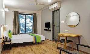 Habitación Deluxe doble | Tabla de planchar con plancha