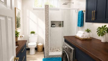 Shower, towels, soap, toilet paper
