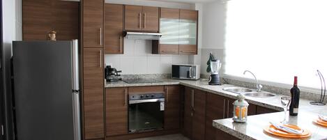 Frigorifero, microonde, forno, macchina per tè/caffè