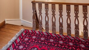 A staircase with ornate railings and a patterned carpet. - White Palace Old City Boutique Hotel (Istanbul)
