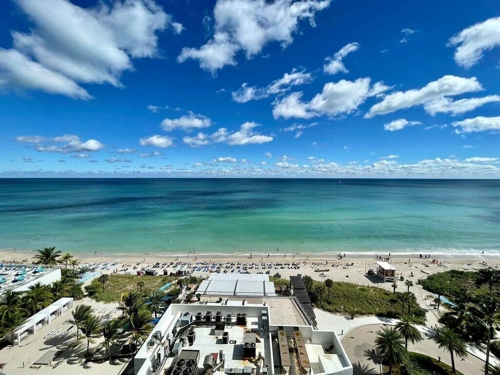 On the beach, sun-loungers, beach towels
