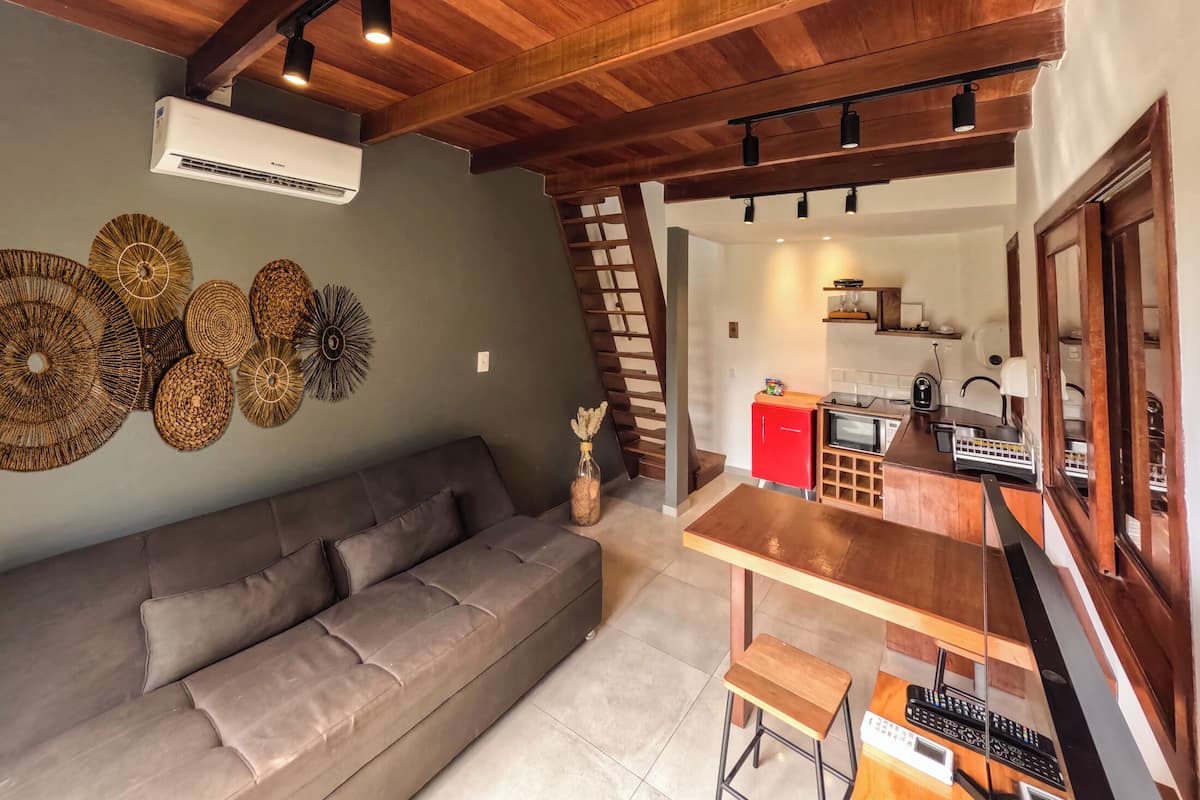 Design Room, 1 King Bed | Living area | 45-inch Smart TV with cable channels, Netflix, streaming services