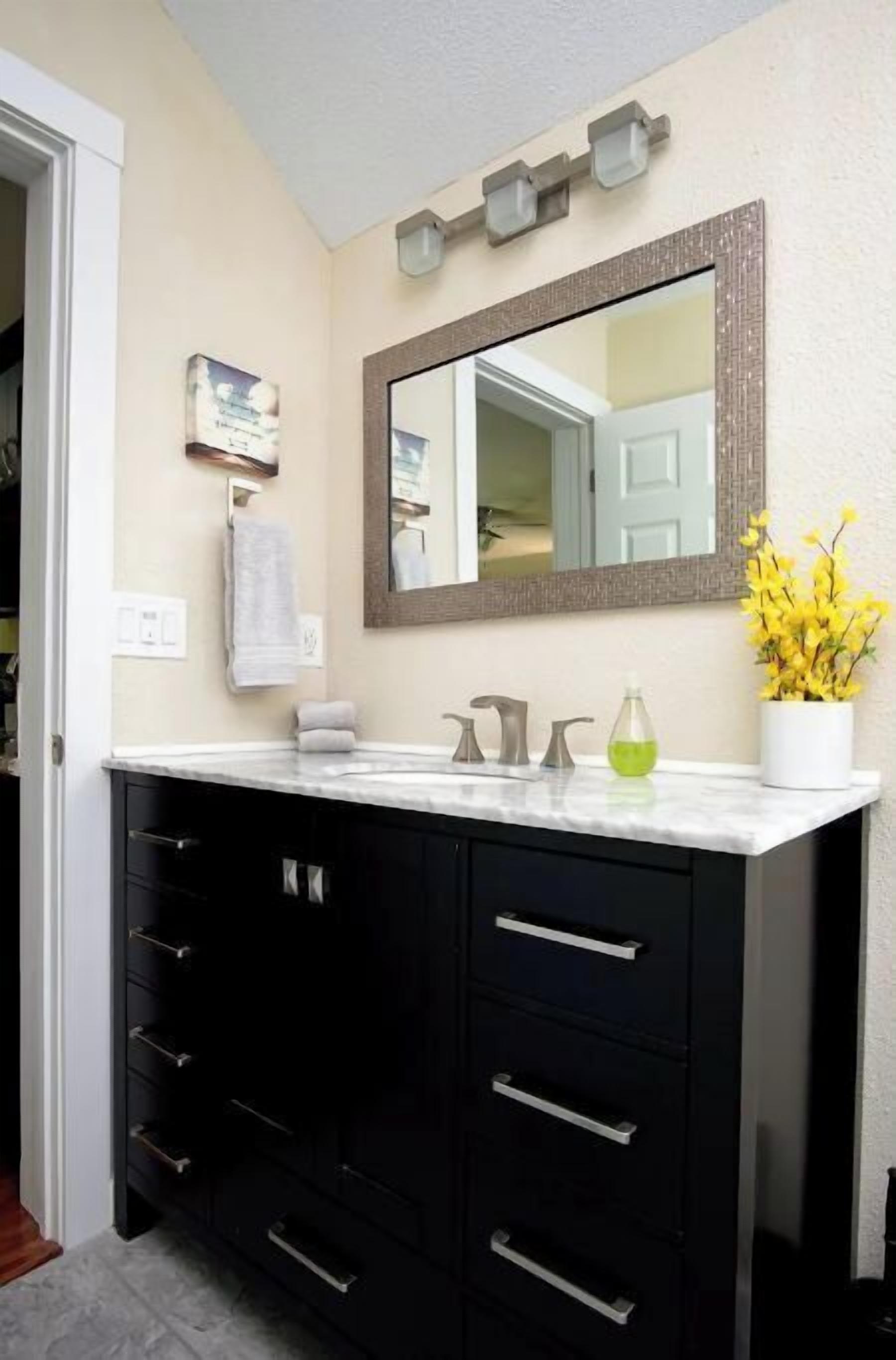 Combined shower/tub, hair dryer, towels, soap