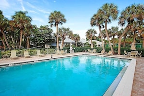 Outdoor pool, a heated pool - Charming Beach Cottage. Walk to Beach, on Bike Path, Screened Porch, Heated Pool (Sanibel)