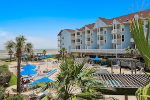 Relax by the pool or enjoy the ocean view from one of our spacious balconies.