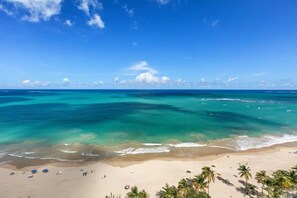 On the beach, sun-loungers, beach towels