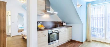 Fridge, microwave, oven, high chair