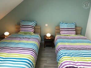 2 quartos, berço de viagem, Wi-Fi de cortesia, roupa de cama