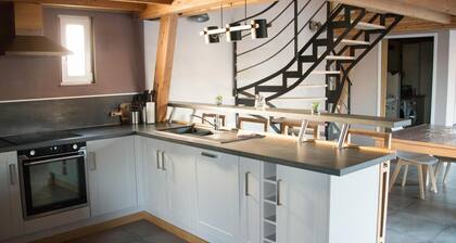Wooden Chalet with Private Garden, Hot Tub, and Parking in Charming Village