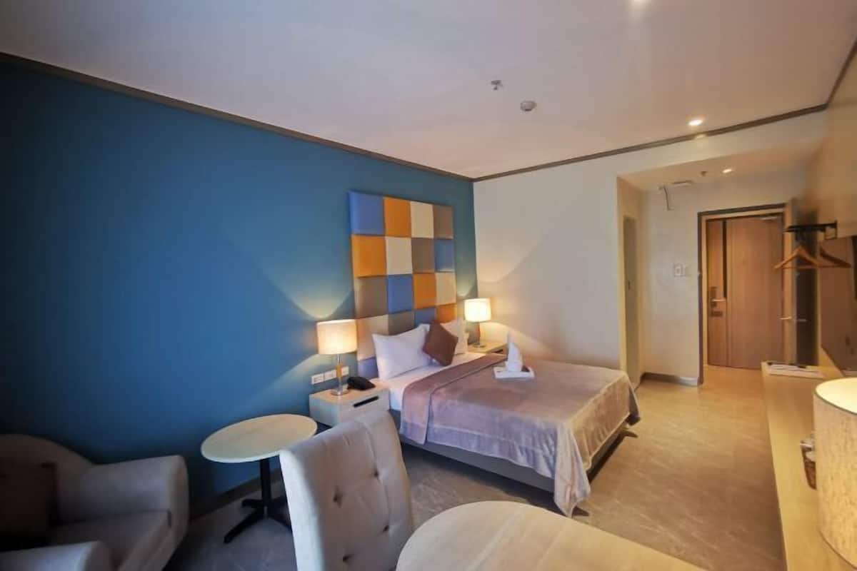 Premium bedding, desk, laptop workspace, free WiFi