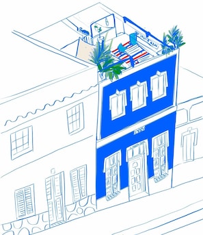 A building with multiple floors, balconies, and windows.