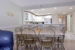 Dining - Bright 3 bedroom ocean block condo with WiFi and an outdoor pool located near downtown and less than a block from the beach! (Ocean City)