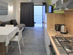 Estúdio grand | Cozinha privada | Cadeirão de bebê