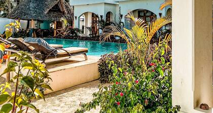 Private boutique hotel - few steps from the beach!