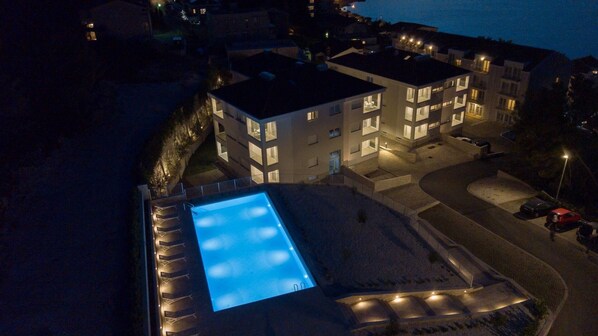 Enjoy a refreshing swim at our rooftop pool overlooking the ocean.