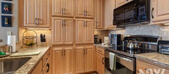 Riverstone Village—Gorgeous Top-Floor Condo, Modern Kitchen, & Community BBQ Area!