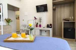 家庭双人房 | 高档床上用品、羽绒被、记忆海绵床垫、免费迷你吧物品