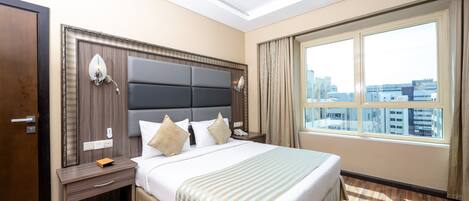 Deluxe Room, 1 King Bed, Smoking, City View | 1 bedroom, Egyptian cotton sheets, premium bedding, memory foam beds