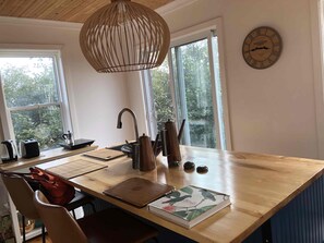 Kitchen with island of New Brunswick birch.