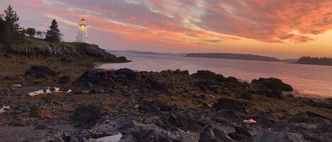 On the beach, sun-loungers